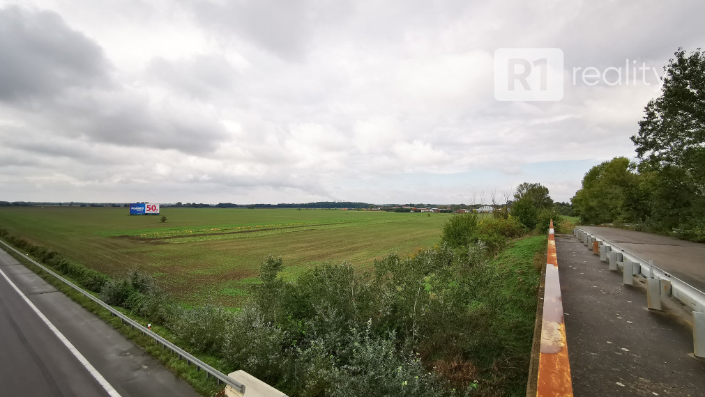 Pozemok pre výstavbu areálu výroby-skladovania / Drahovce časť Voderady